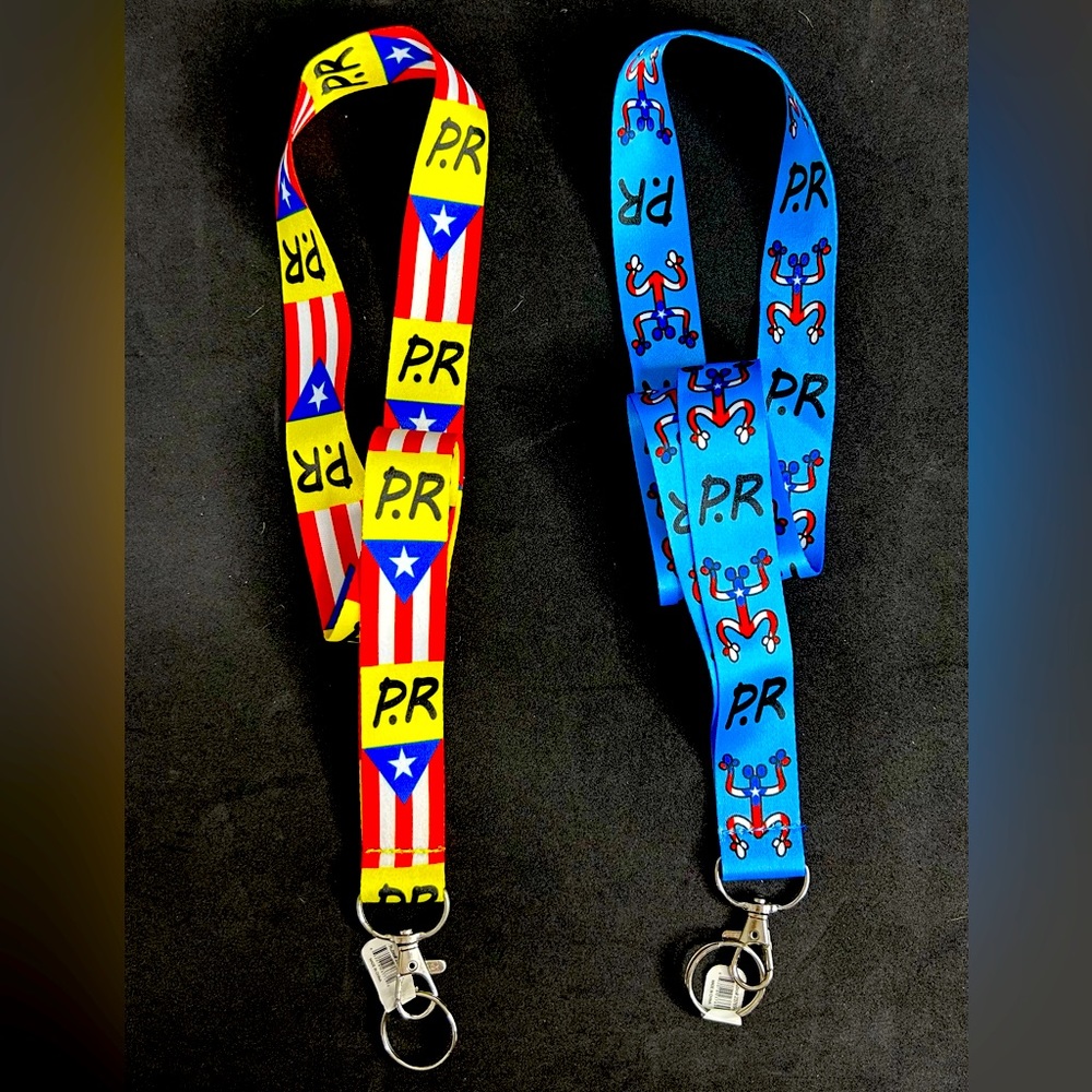 Lanyarn set of 2. New. Reversible. “Puerto Rico Flag”and “Coqui Taino” prints.